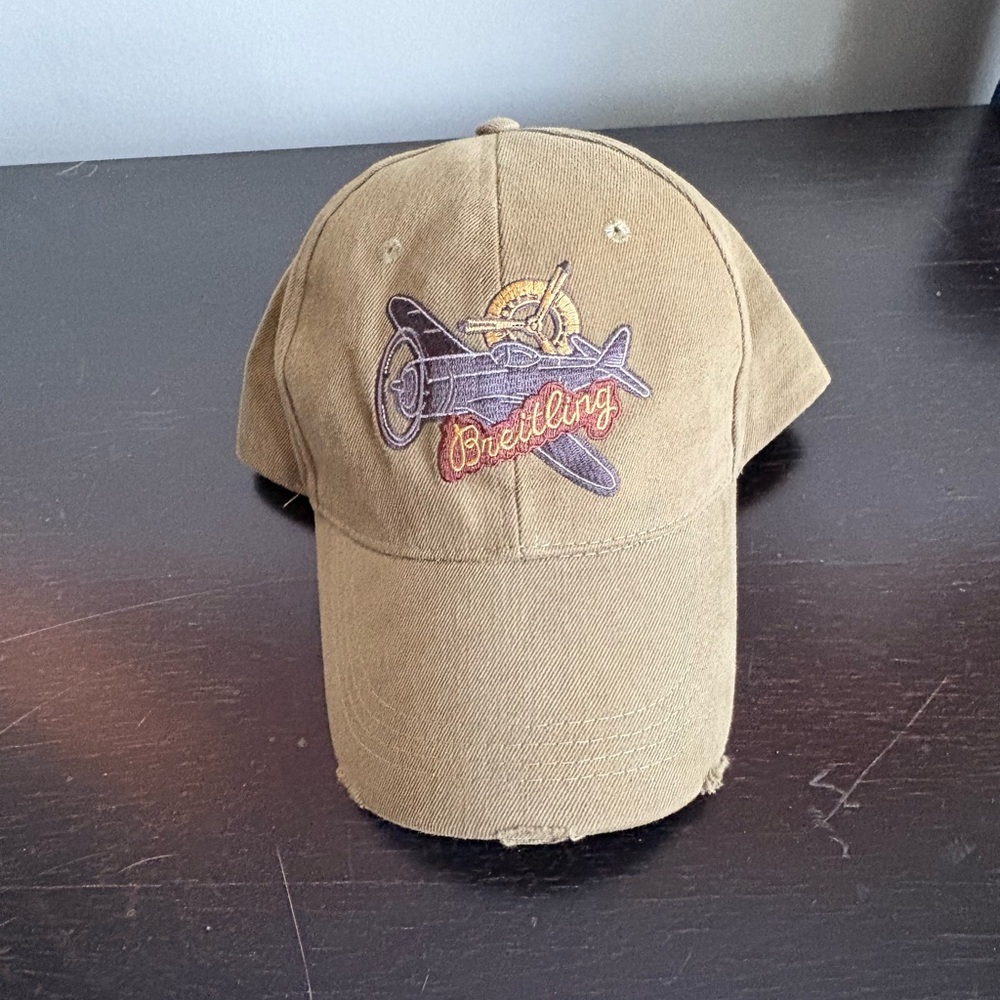 Breitling Embroidered Airplane Distressed Hat
Olive with leather strap
